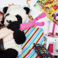Sexy girl fucks with nasty panda bear